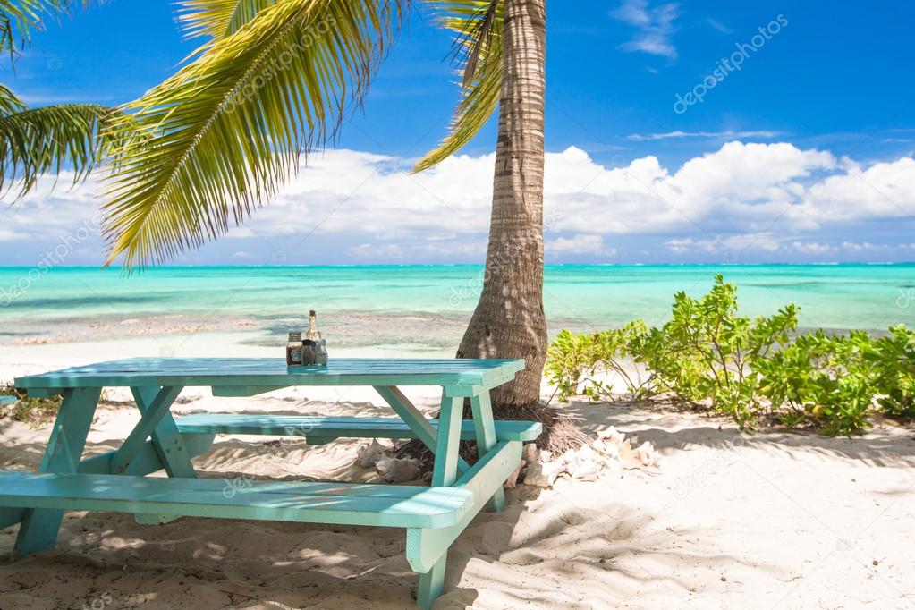 Outdoor cafe on tropical beach at Caribbean