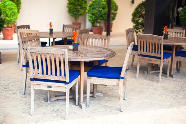 Summer empty open air cafe near swimming pool — Stock Photo, Image