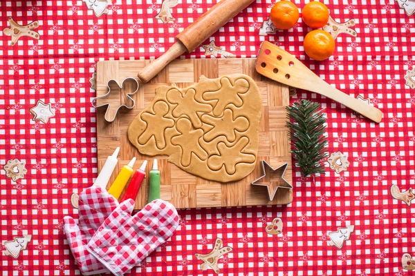 Making gingerbread man and christmas cookies