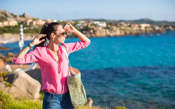 Young beautiful woman during summer vacation — Stock Photo, Image