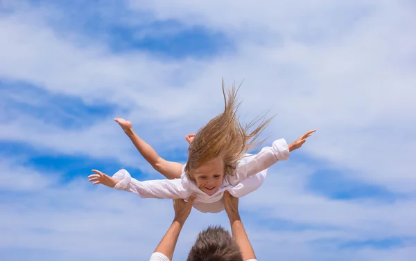Adorable little girl and happy father have fun — Stock Photo, Image