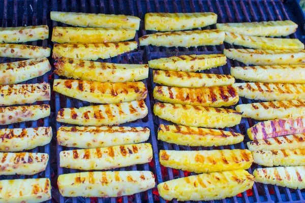 Fried pineapples on grill outdoor — Stock Photo, Image