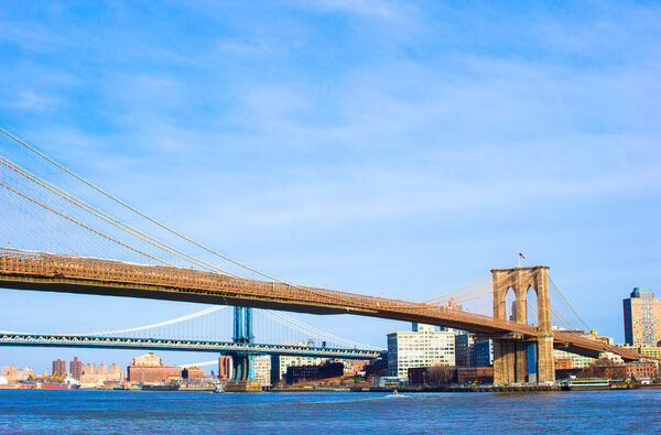 Brooklyn Bridge over East River viewed from New York City, USA