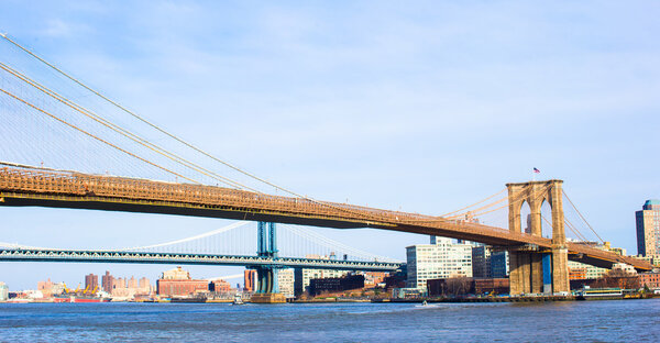 Brooklyn Bridge over East River viewed from New York City, USA