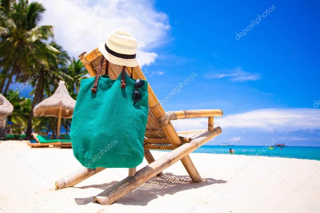 Beach wooden chair for vacations on tropical beach