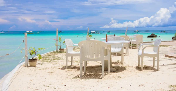 Outdoor white cafe on tropical beach — Stock Photo, Image