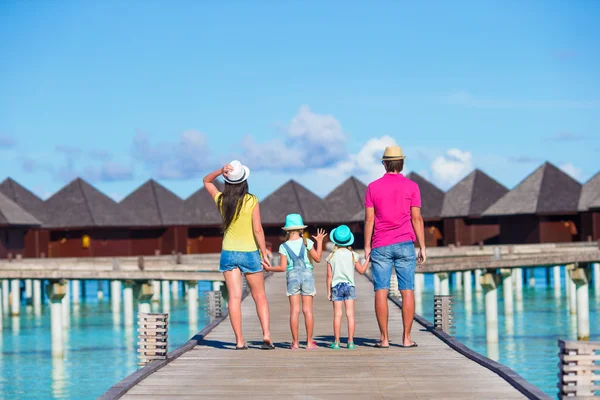Back view of beautiful family on summer vacation — Stock Photo, Image