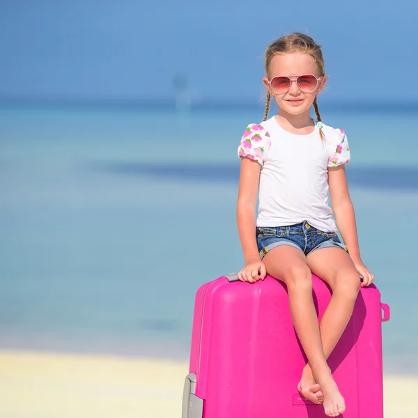 Little adorable girl with big luggage during summer vacation — Stock Photo, Image