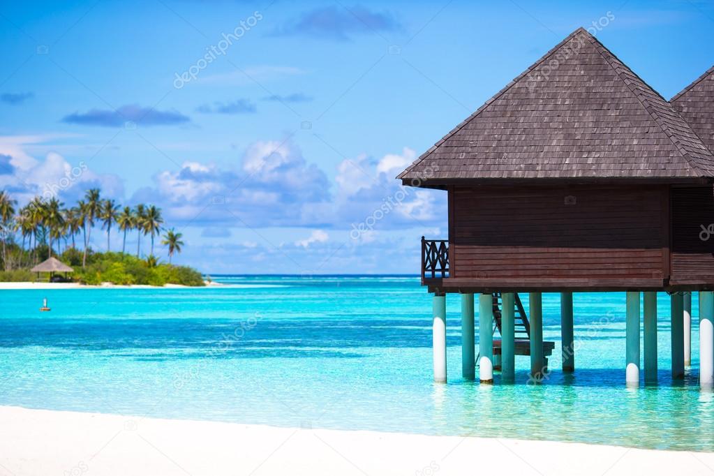 Water bungalows with turquiose water on Maldives