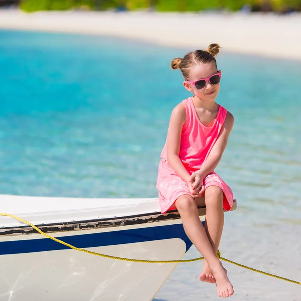 Adorable little girl on boat during summer vacation — Stock Photo, Image