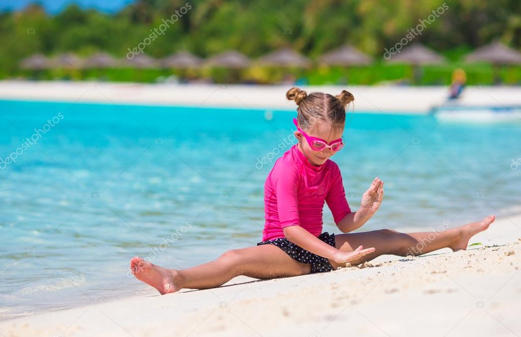 8 years old girl on the beach, Stock Photo, Picture And Rights Managed  Image. Pic. S73-1560686