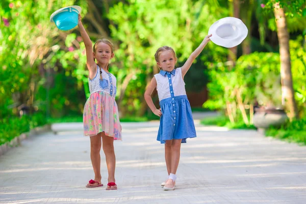 Adorable little girls during summer tropical vacation — Stock Photo, Image