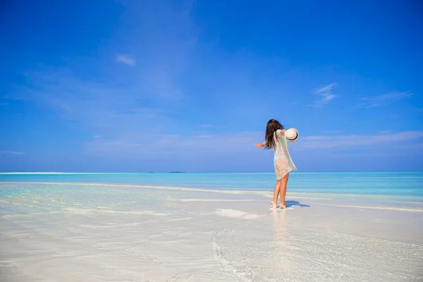 Young woman enjoy tropical beach vacation Stock Picture