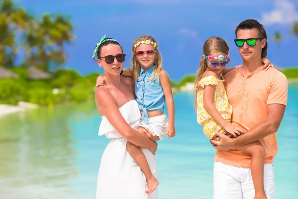 Beautiful family during summer tropical vacation — Stock Photo, Image