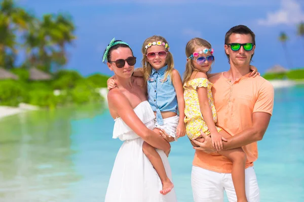 Beautiful family during summer tropical vacation — Stock Photo, Image