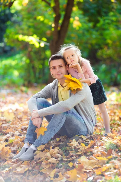 Happy family having fun on beautiful autumn day — Stock Photo, Image