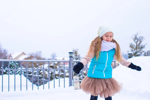 Adorable little girl having fun during winter vacation — Stock Photo, Image
