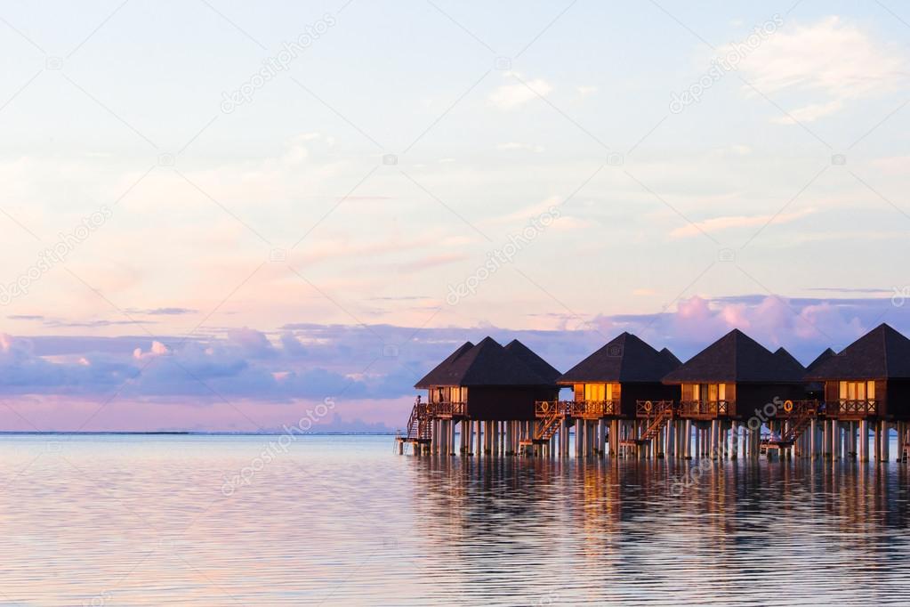 Water villas, bungalows on ideal perfect tropical island