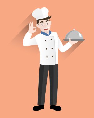 Bir gümüş tepsi tutarak profesyonel şef