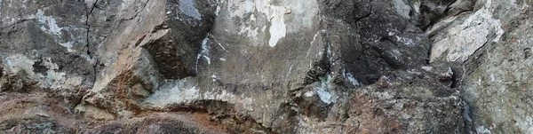 Texture of natural stone rock, background wallpaper white, gray and black splashes on the surface. Horizontal rectangular photography — Stock Photo, Image