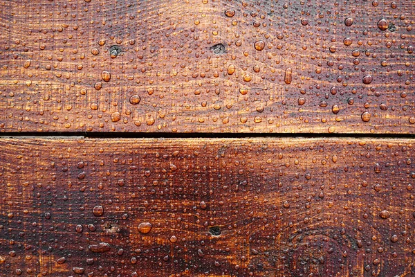 Beautiful old wooden surface, covered with raindrops. Beautiful background. Top view. — Stock Photo, Image