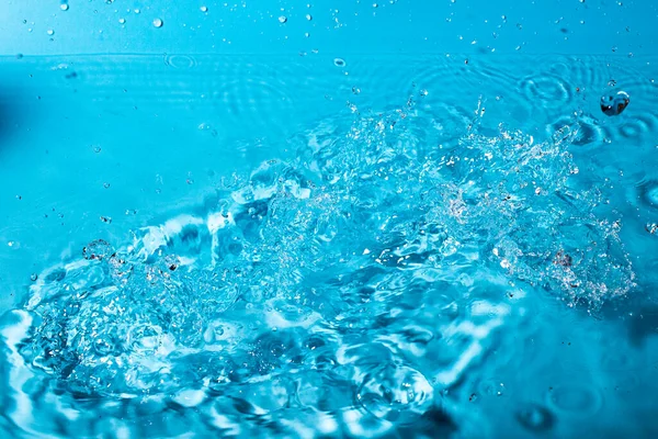 Wasserspritzer Auf Blauem Hintergrund Abstrakte Tapete — Stockfoto