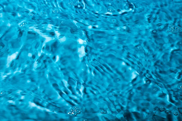 Plons Water Een Blauwe Achtergrond Abstract Behang — Stockfoto