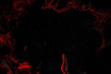 Sıvı sanatının dokusu. Girdap boyası efektli soyut bir arka plan. Sıvı akrilik boya arka planı. Siyah, mavi ve kırmızı renkler.