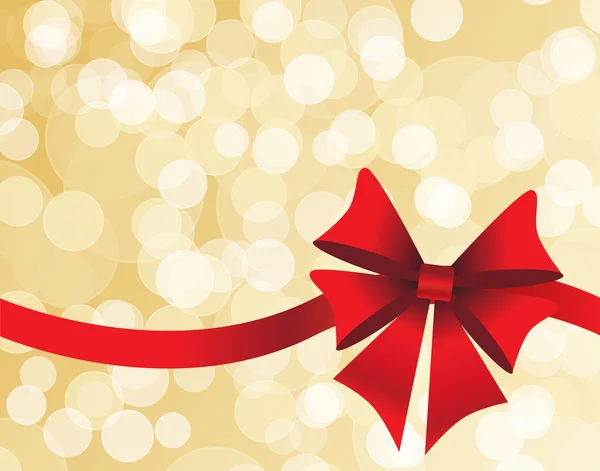 Golden background with a red bow — Stock Photo, Image