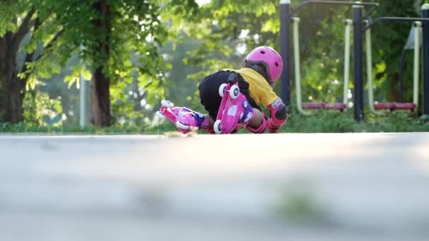 Little Girl Wearing Protection Pads Safety Helmet Learning Roller Skate — Stock Video