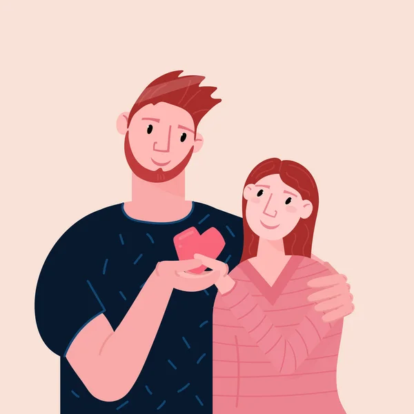 Romantik çift kalbini tutar. Erkek ve kadının flört ederken çekilmiş bir portresi. Sevgililer Günü tebrik kartı ve sıcacık sarılma..
