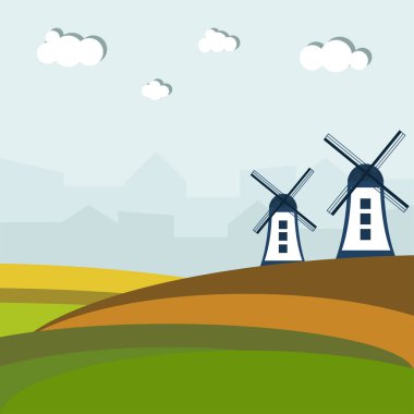 Yel değirmenli renkli tarlalar, şehir sisi