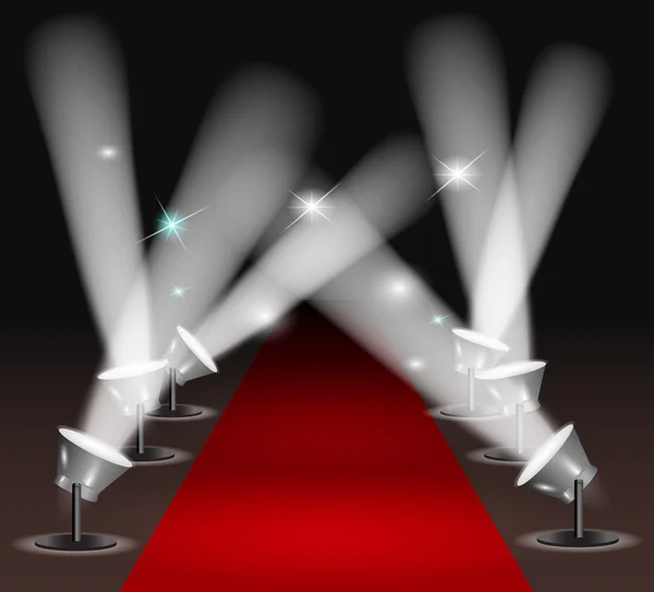 Red carpet with spotlights — Stock Vector