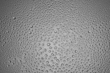 Arka plan damla çelik renkli cam üzerinde farklı boyutta