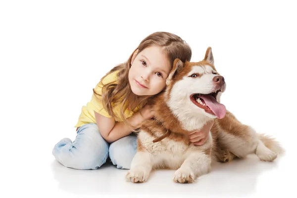 Ragazza con un husky — Foto Stock