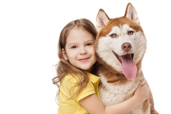 Flicka med en husky — Stockfoto