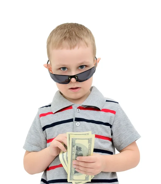 Niño cuenta el dinero en un fondo blanco — Foto de Stock