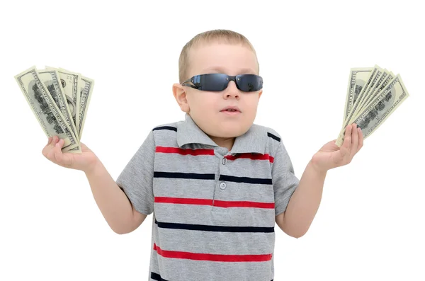 Chłopiec w zdumienie trzyma pieniądze na białym tle — Zdjęcie stockowe