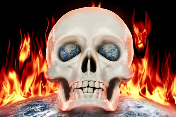 Mänsklig skalle på en bakgrund av planetjorden i brand. — Stockfoto