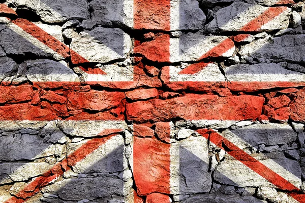 Textura de pared de piedra con una imagen de Union Jack . —  Fotos de Stock