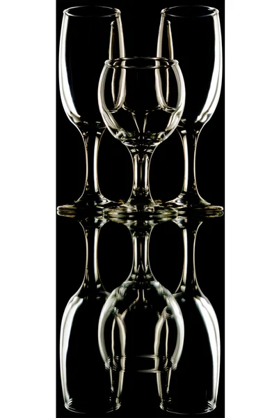 Transparent wine glasses on the black-and-white background with reflection — Stock Photo, Image