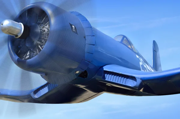 American carrier-based fighter is flying against the blue sky — Stock Image American carrier-based fighter is flying against the blue sky Stock Image