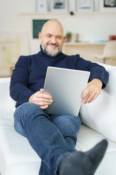 Smiling contented middle aged man — Stockfoto