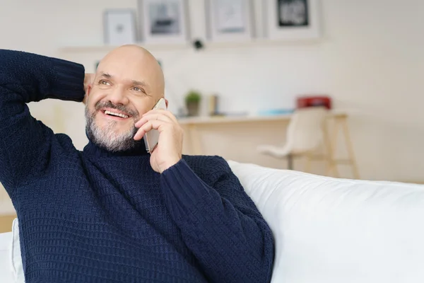 Handsome mature man on phone indoors — Stock Photo, Image