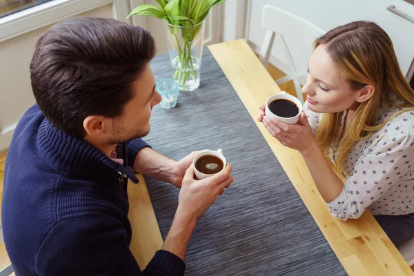 High angle view of couple drinking coffee — Stock Photo, Image