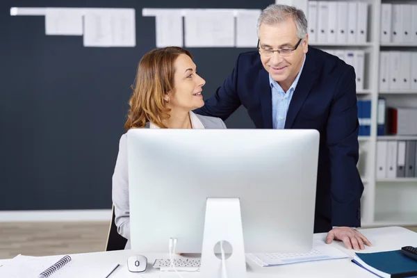 Middle-aged business partners in the office — Stock Photo, Image