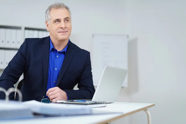 Thoughtful businessman seeking a solution — Stok fotoğraf