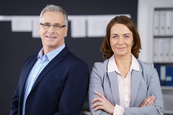 Pair of confident middle aged business people — Stock Photo, Image