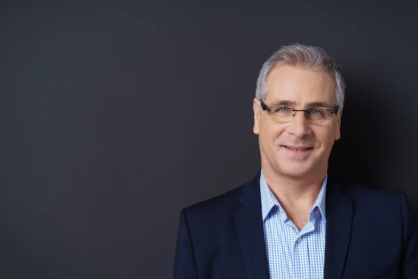 Handsome middle-aged man in eyeglasses — Stock Photo, Image