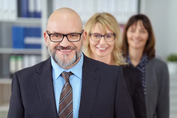 Smiling friendly male business executive — Stock Photo, Image